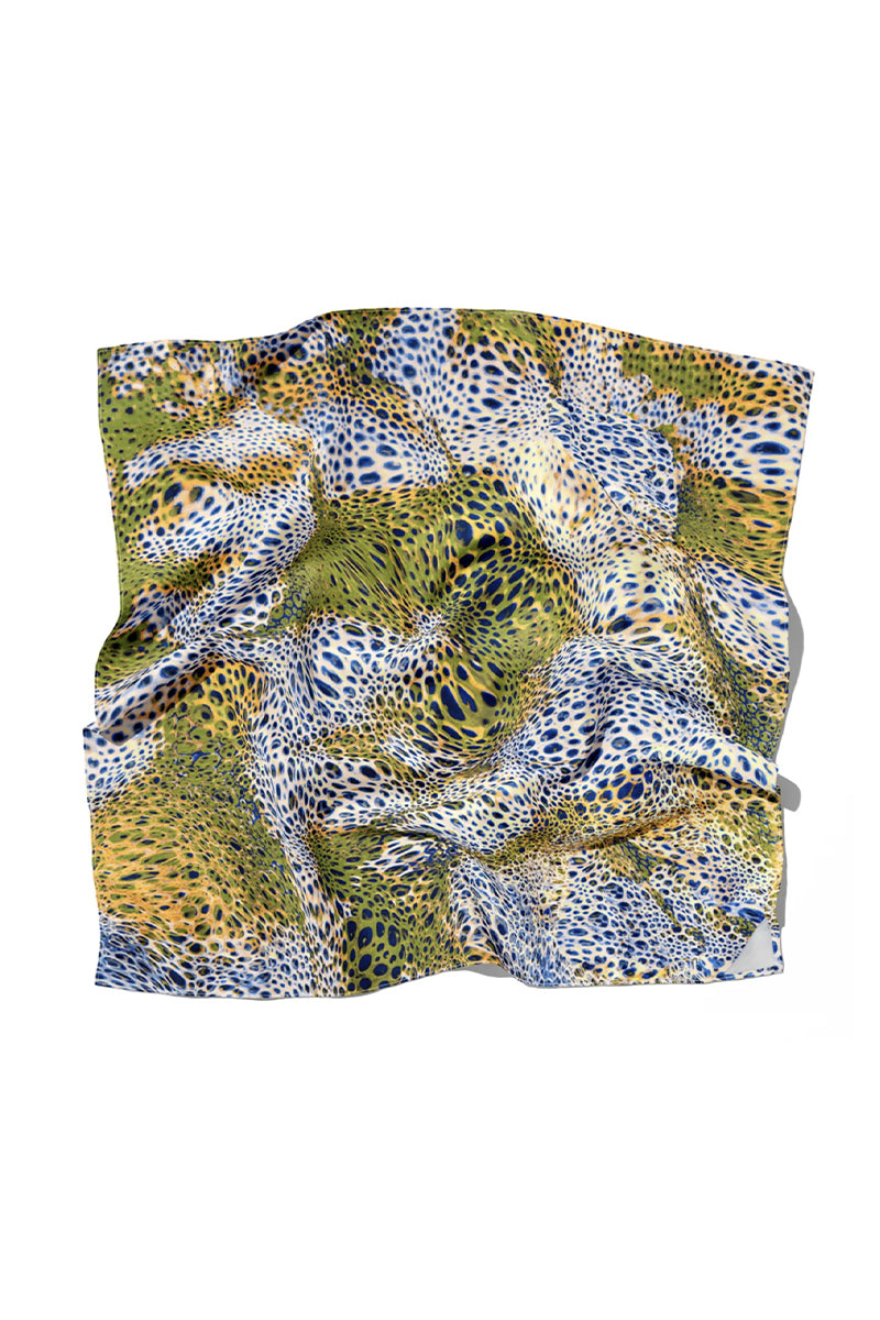 Elegant silk GIO MOUSSARD scarf by Amel Batita featuring vibrant floral patterns and lightweight, luxurious fabric.