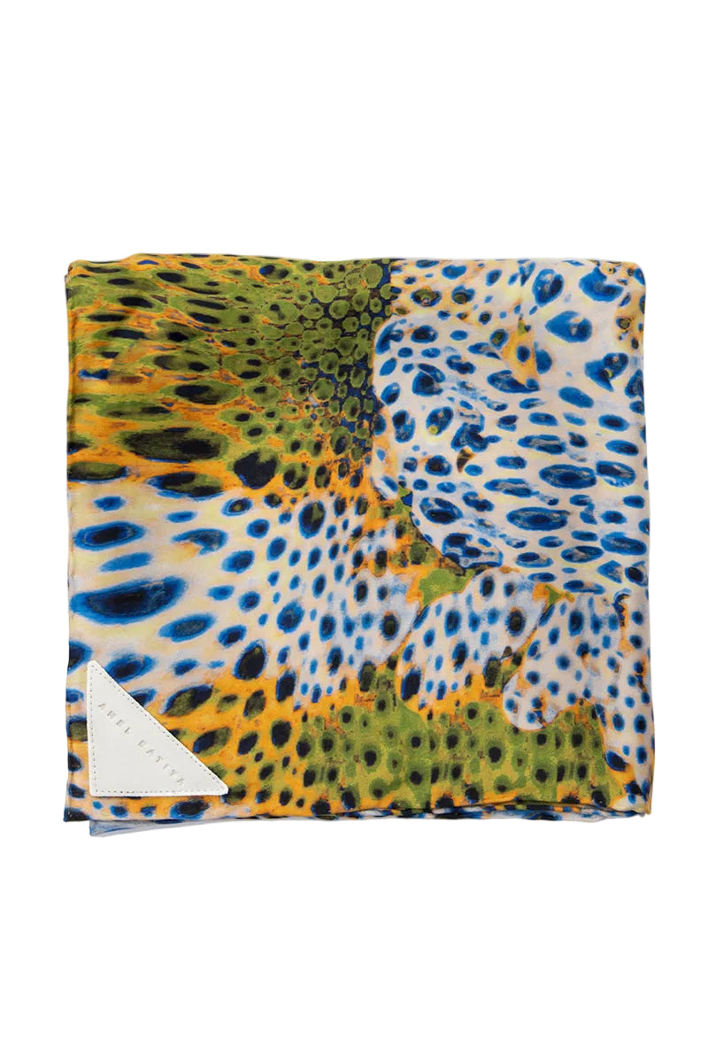 Elegant silk GIO MOUSSARD scarf by Amel Batita featuring a signature pattern in soft, flowing fabric.