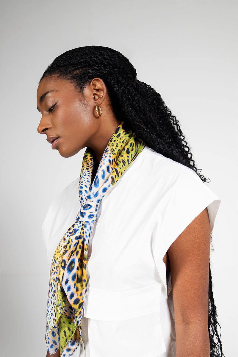 Amel Batita GIO MOUSSARD silk scarf with a 90-inch tie featuring a vibrant, intricate pattern and luxurious fabric.