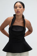 Black Giselle top by Ana + Maria, showcasing the stylish sleeveless design and fitted silhouette in a web size 2 image.