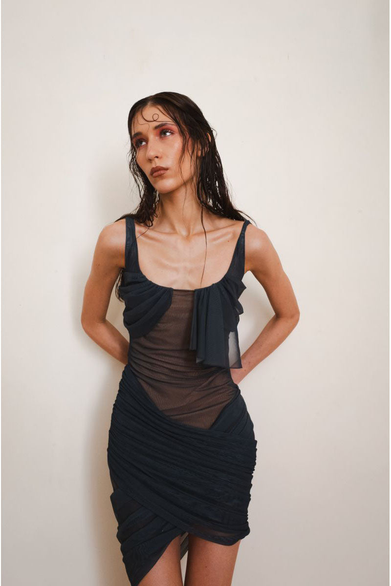 Front view of YASSMIN SALEH Glimpse Black Midi Dress, stylish and elegant with a fitted silhouette and sleeveless design.