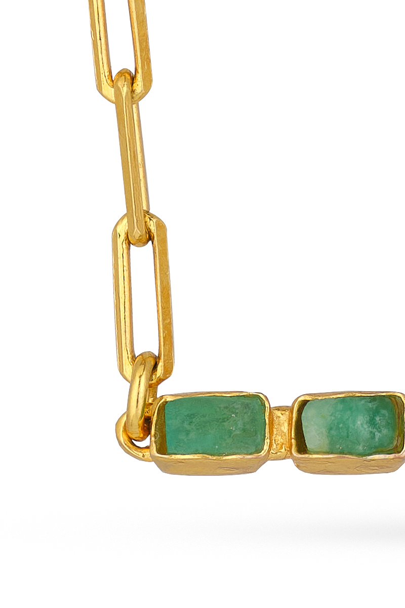 Gold Gloom Necklace by Fenomena featuring a sleek, modern design with a bold pendant on a delicate chain.