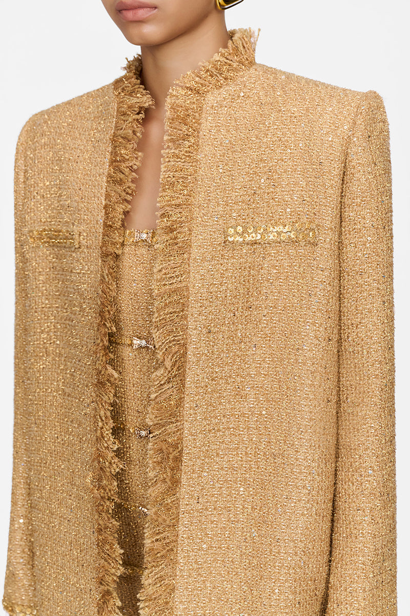 Montsand Gold Julia Jacket in shiny gold fabric, stylish women's jacket with a sleek fit and modern design.