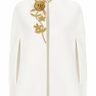 Gold thread embroidered cape by Monika Dimova, elegant jacket featuring intricate gold embroidery and flowing fabric.