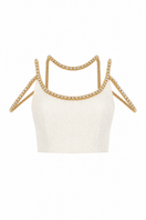 Gold thread-embroidered tweed top by Monika Dimova, featuring intricate gold embroidery on classic tweed fabric.