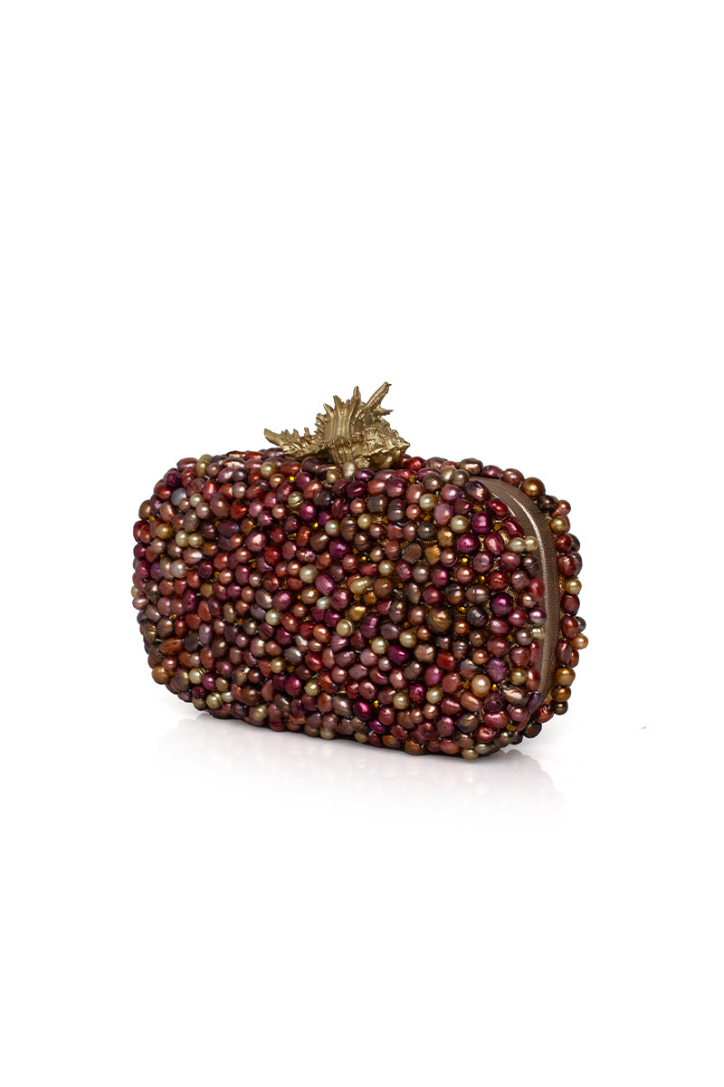 Golden Murex Loulou bronze clutch by Sarah's Bag featuring intricate metallic design and compact, elegant style.