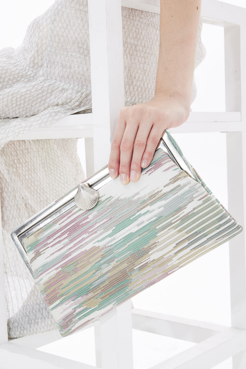 Sarah's Bag pastel Grace clutch purse with a sleek, elegant design, perfect for evening or special occasions.