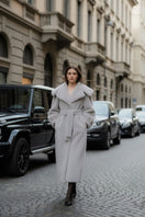 Gray faux fur coat by Fortini, stylish Old Money design, featuring plush texture and tailored fit.