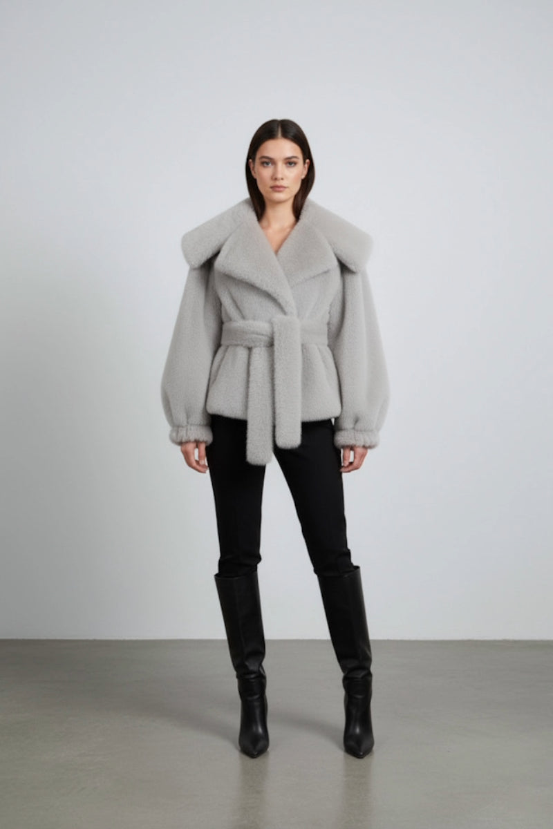 Gray faux fur jacket by Fortini, old money style, featuring a plush texture and classic cut, perfect for elegant winter wear.