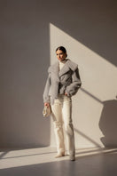 Gray faux fur jacket from Fortini's Old Money collection, featuring a plush, stylish design perfect for cold weather.
