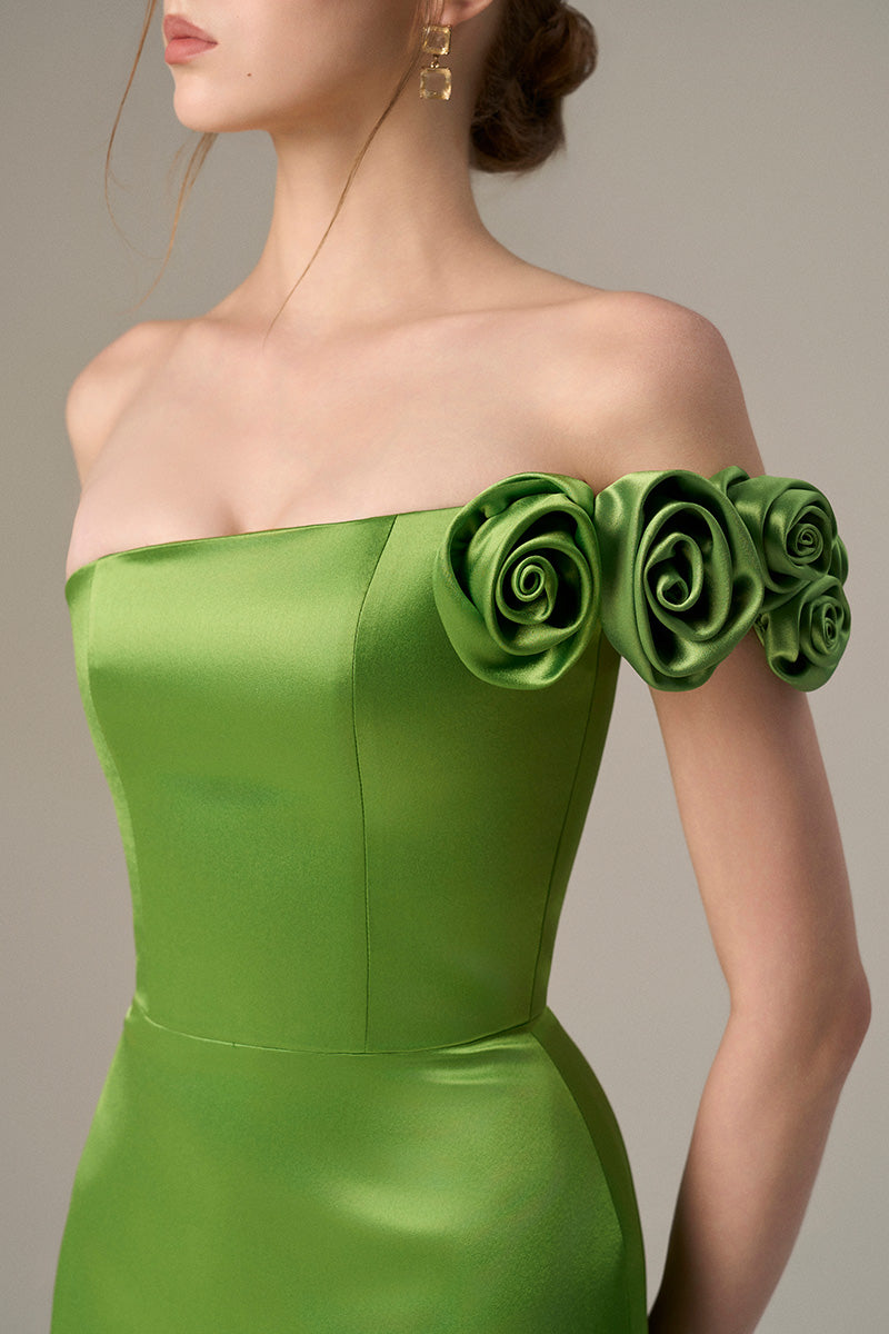 Green I.H.F maxi bustier gown with satin floral appliqué, elegant evening dress with a fitted bodice and flowing skirt.