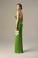 Green satin silk halter gown with pleated detailing, designed by I.H.F, featuring a smooth, elegant fabric and stylish neckline.