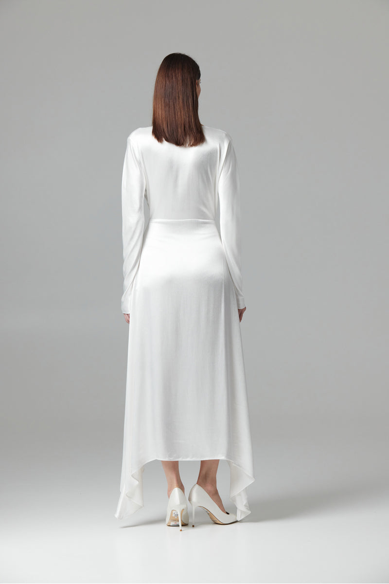 White Greta maxi dress by Tamar Keburia, flowing fabric and elegant design, shown on a model.
