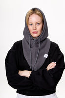 Gray LE SH KA balaclava hat, close-up showing soft knit fabric and snug fit for winter warmth and protection.