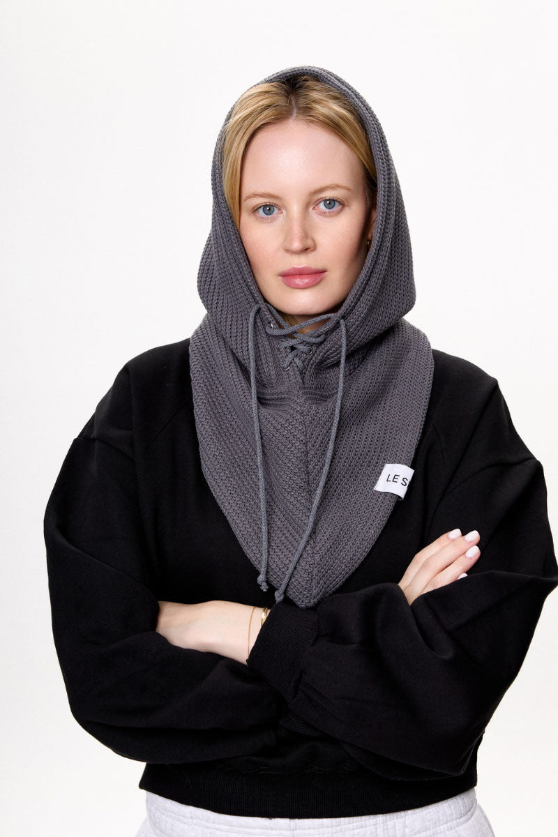 Gray LE SH KA balaclava hat, close-up showing soft knit fabric and snug fit for winter warmth and protection.