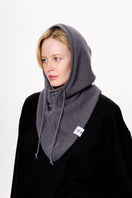 Gray balaclava hat by LE SH KA, close-up showing soft knit fabric and snug fit, ideal for cold weather protection.