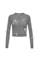 Gray 3D floral cardigan by Montsand, showcasing a cozy knit top with textured floral design in soft gray.