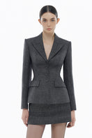 Gray single-breasted blazer by Montsand, tailored fit, shown with matching skirt in a professional fashion setting.