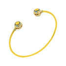 Álvaro Ávila Guardian Sphere Bangle Bracelet featuring a blue spherical design on a sleek metal band.