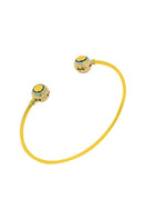 Álvaro Ávila Guardian Sphere Bangle Bracelet featuring a blue spherical design on a sleek metal band.