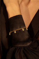 Álvaro Ávila Guardian Charm Bracelet featuring a blue bracelet with silver charm details, stylish and elegant jewelry accessory.