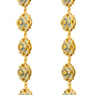 Álvaro Ávila Guardian Slim Drop Earrings in blue with sleek, minimalist design, hanging elegantly on a neutral background.