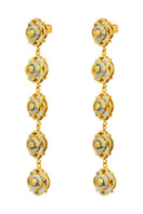 Álvaro Ávila Guardian Slim Drop Earrings in blue with sleek, minimalist design, hanging elegantly on a neutral background.