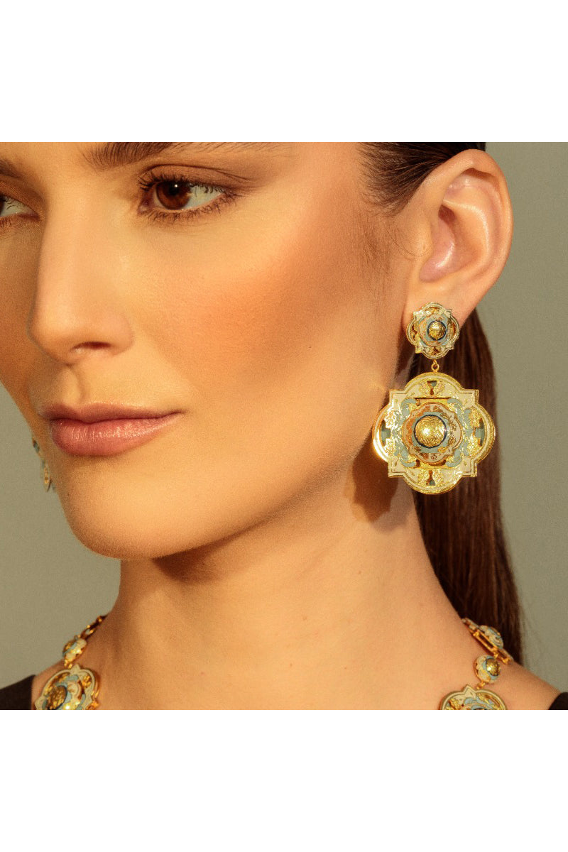 Álvaro Ávila Guardian Bold Drop Earrings in vibrant blue color, showcasing sleek, modern design with smooth, curved metal details.
