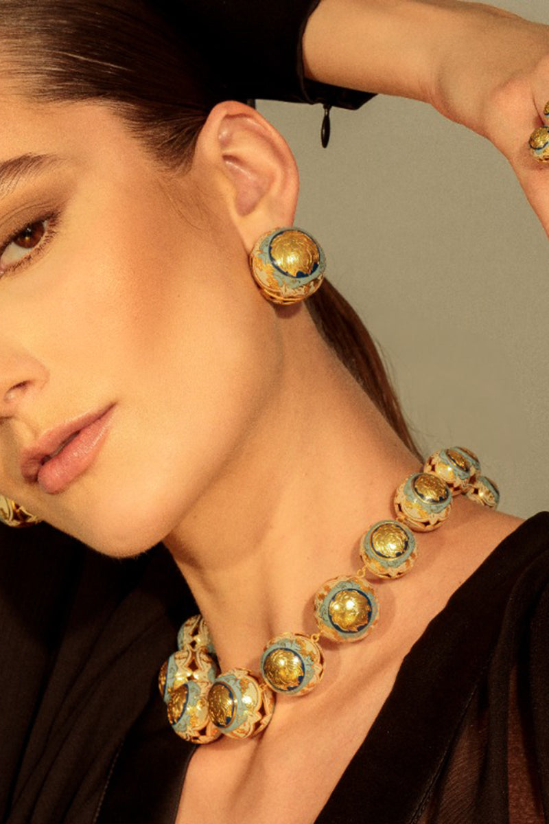 Álvaro Ávila Guardian Statement Necklace featuring a bold blue pendant on a sleek chain, stylish and modern jewelry piece.