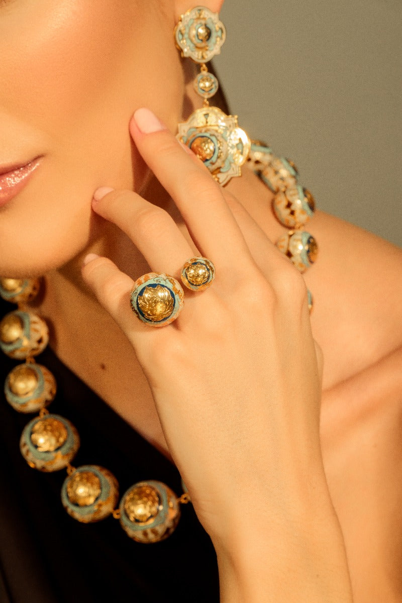 Álvaro Ávila Guardian Statement Ring Double U in blue, featuring a bold design with intricate detailing, close-up view of the ring.