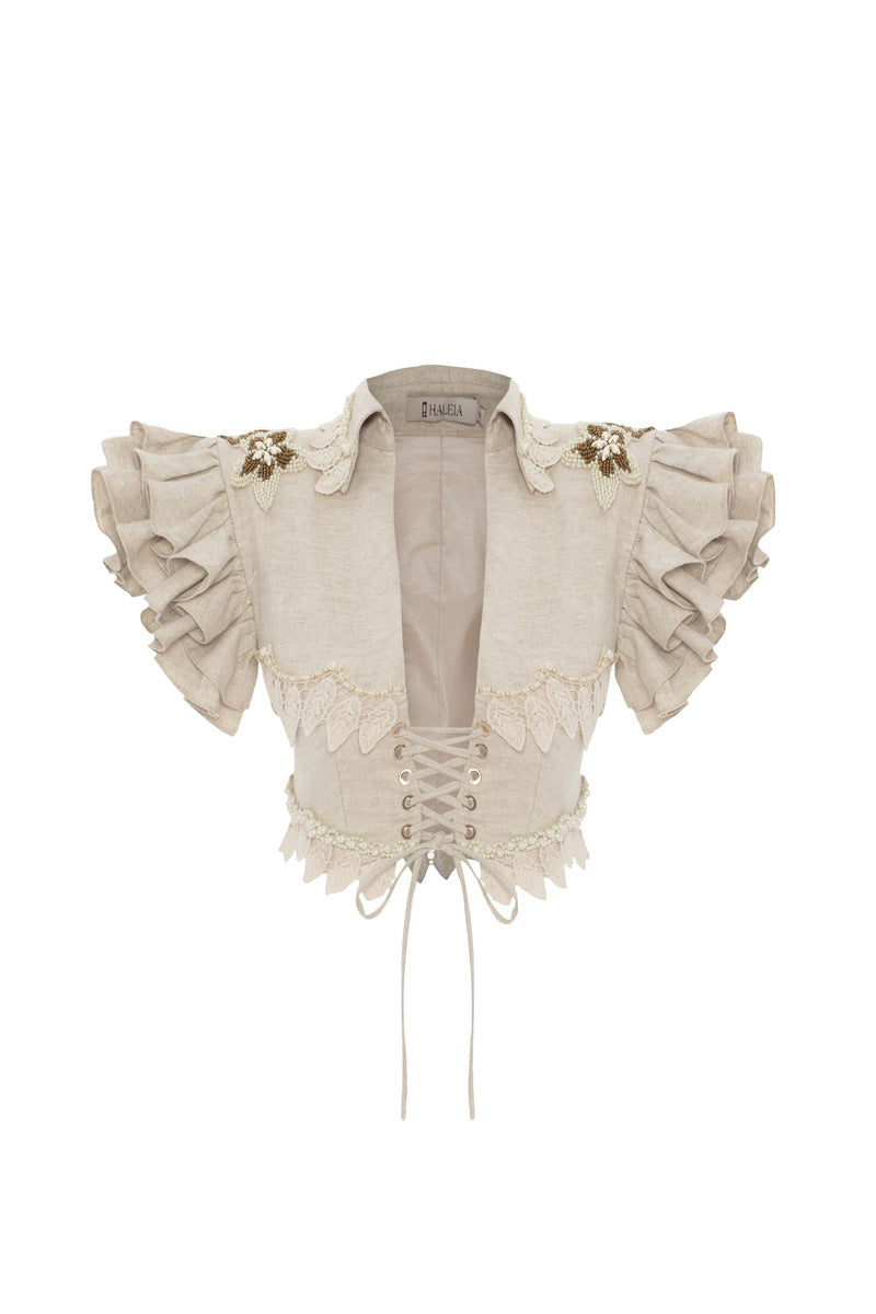Beige handmade lace detailed ruffled linen jacket by HALEIA, front view showcasing intricate lace and ruffle design.