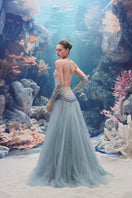 Light blue Muriel glitter tulle gown with matching gloves by 21Six, showcasing elegant fabric and detailed design.