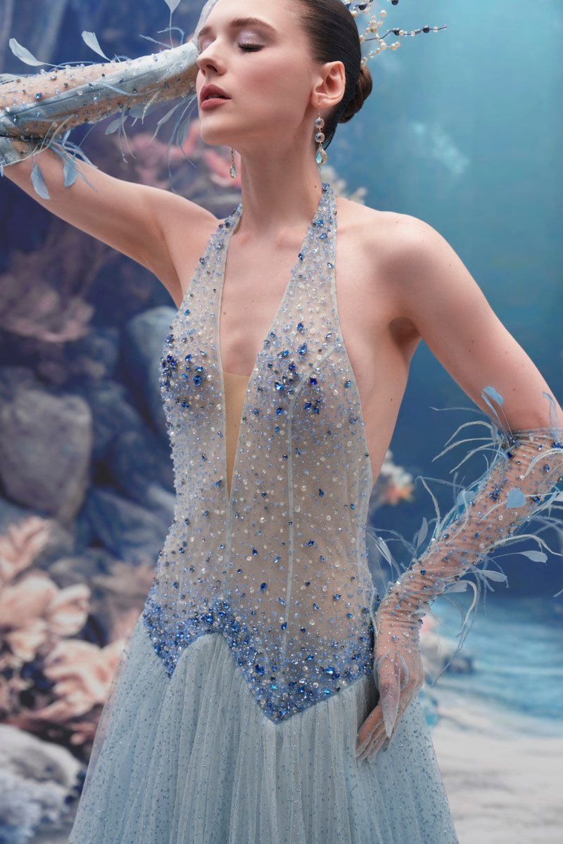 Light blue Muriel glitter tulle gown by 21Six with matching gloves, featuring elegant design and sparkling fabric detail.