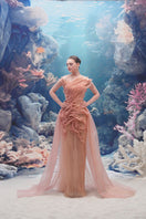 Light pink tulle and organza gown by 21Six, featuring elegant fabric and a flowing silhouette, perfect for formal occasions.