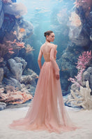 Light pink tulle and organza gown by 21Six featuring delicate fabric layers and elegant design, perfect for formal occasions.