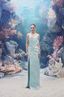 Light blue Sirena Water Silk Taffeta gown by 21Six, elegant evening dress with flowing fabric and intricate design details.
