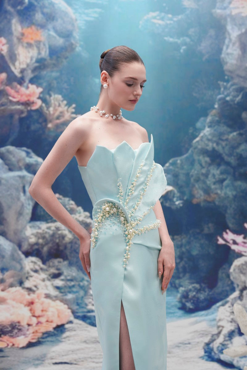 Light blue Sirena water silk taffeta gown by 21Six, elegant evening dress with flowing fabric and intricate details.