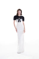 Elegant ivory Bianca contrast sequin gown by HACCHIC COUTURE featuring intricate sequin detailing and a flowing silhouette.