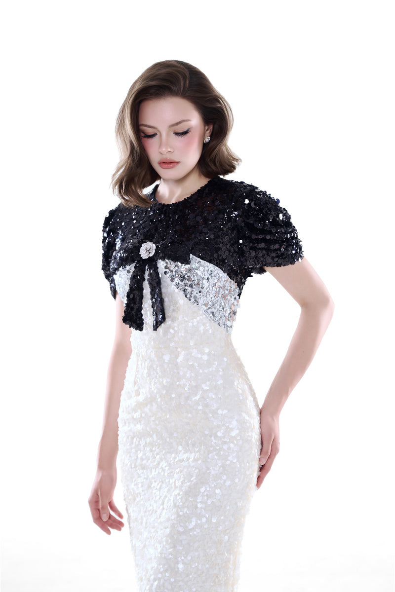 Ivory Bianca contrast sequin gown by HACCHIC COUTURE, elegant maxi dress with shimmering sequin details and flowing fabric.