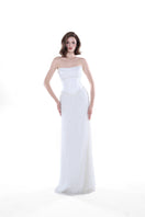 Ivory Camellia Pearl Corset Gown by HACCHIC COUTURE featuring intricate pearl details and elegant silhouette.