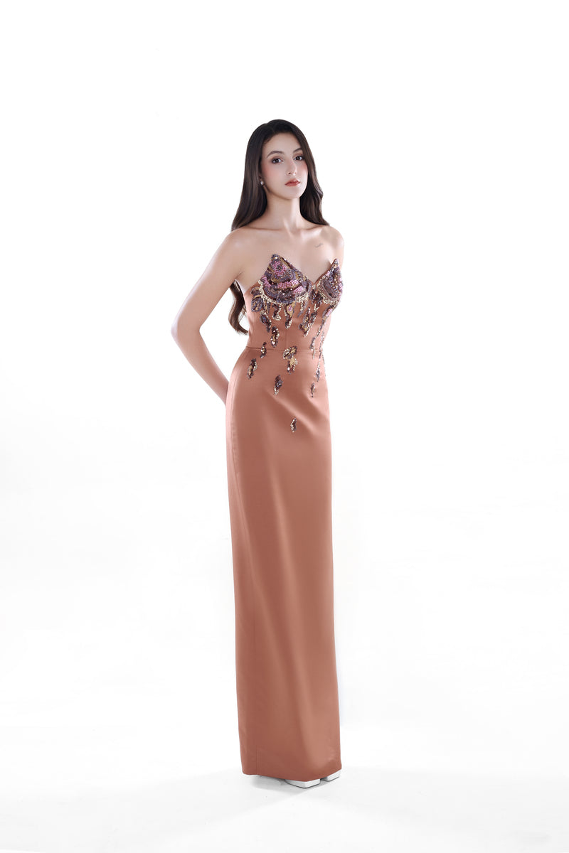 Blush nude Aurora embellished column dress by HACCHIC COUTURE, featuring intricate detailing and a sleek maxi silhouette.