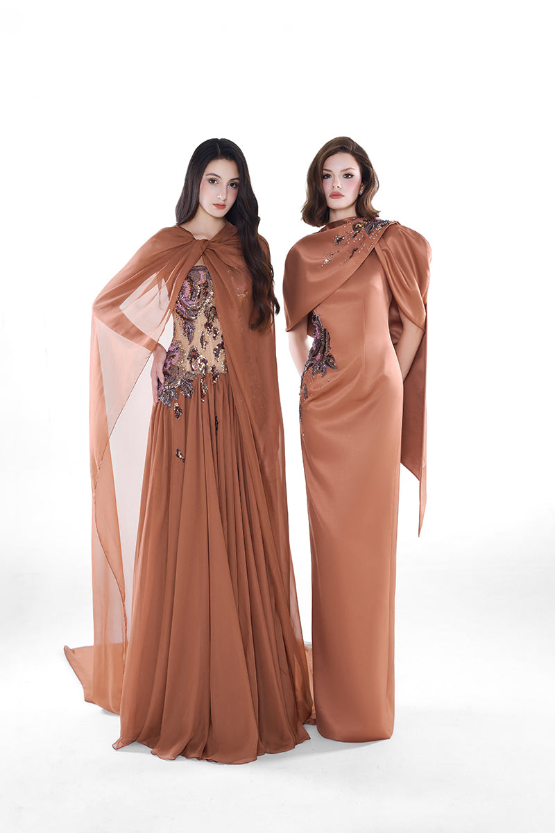 HACCHIC Couture Aurora cape gown in cinnamon rose, a flowing maxi dress with elegant drape and luxurious fabric.