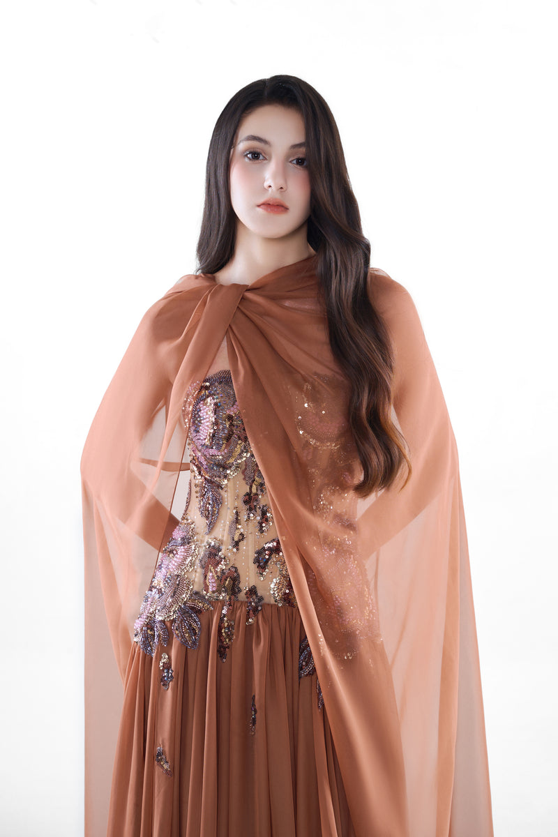 HACCHIC Couture Aurora embellished cinnamon rose maxi gown with intricate beadwork and flowing fabric.