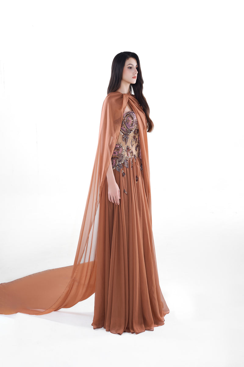HACCHIC Couture Aurora embellished cinnamon rose maxi dress with intricate beadwork and flowing fabric.
