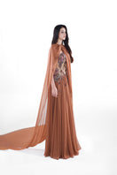 Elegant HACCHIC Couture Aurora embellished gown in cinnamon rose with intricate beadwork and flowing fabric.