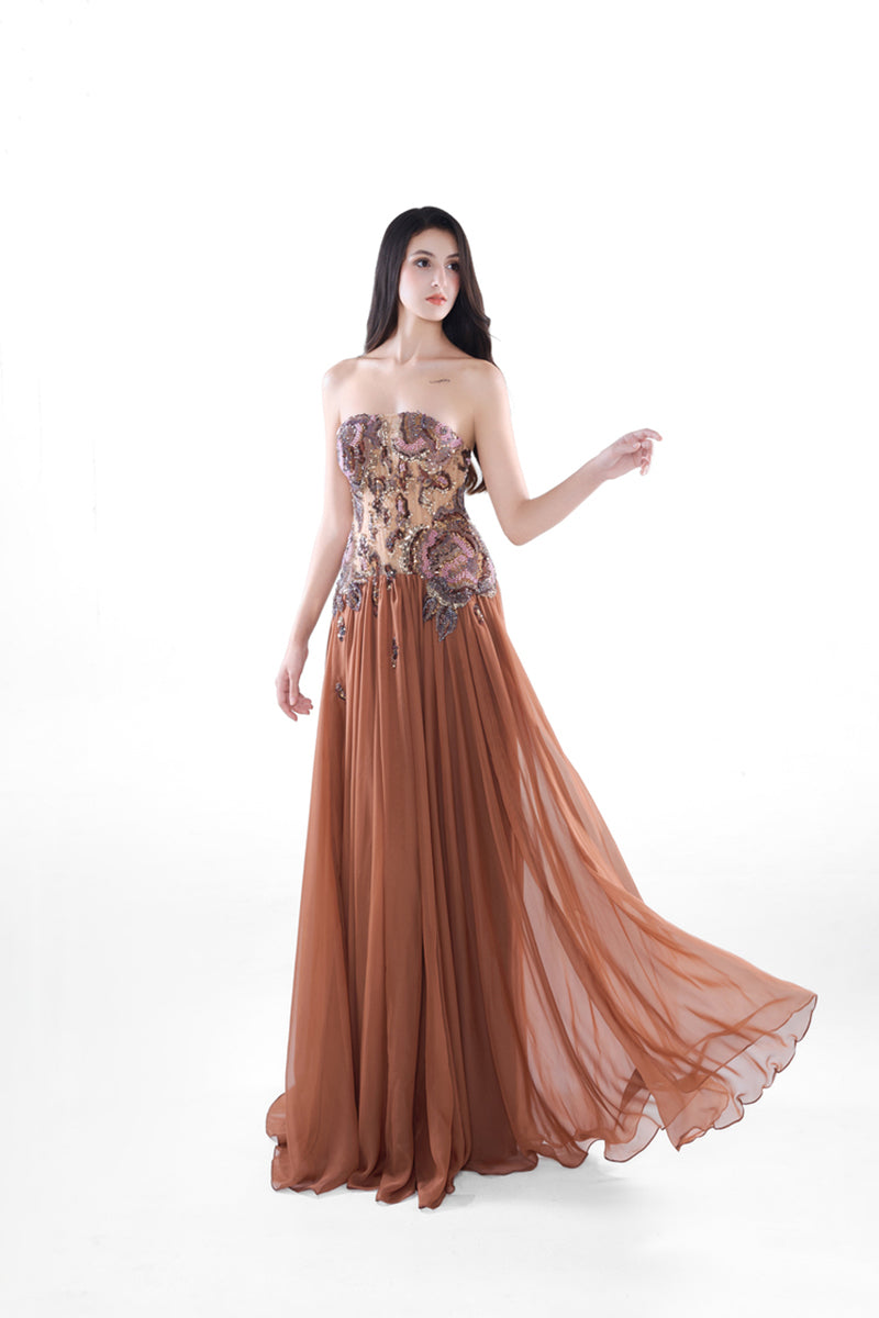 HACCHIC Couture Aurora Caped Gown in Cinnamon Rose, elegant maxi dress with flowing fabric and stylish cape detail.