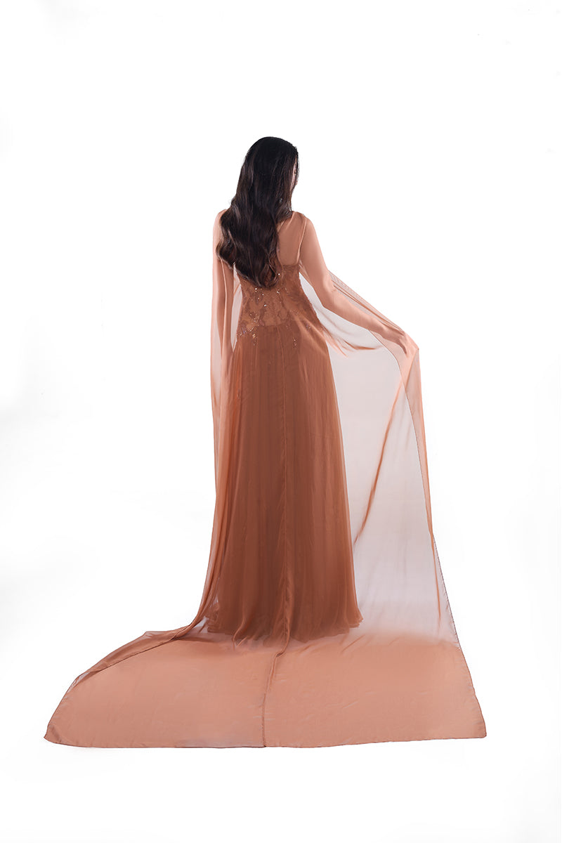 HACCHIC Couture Aurora cape gown in cinnamon rose, featuring flowing maxi dress with elegant cape detail, perfect for formal occasions.