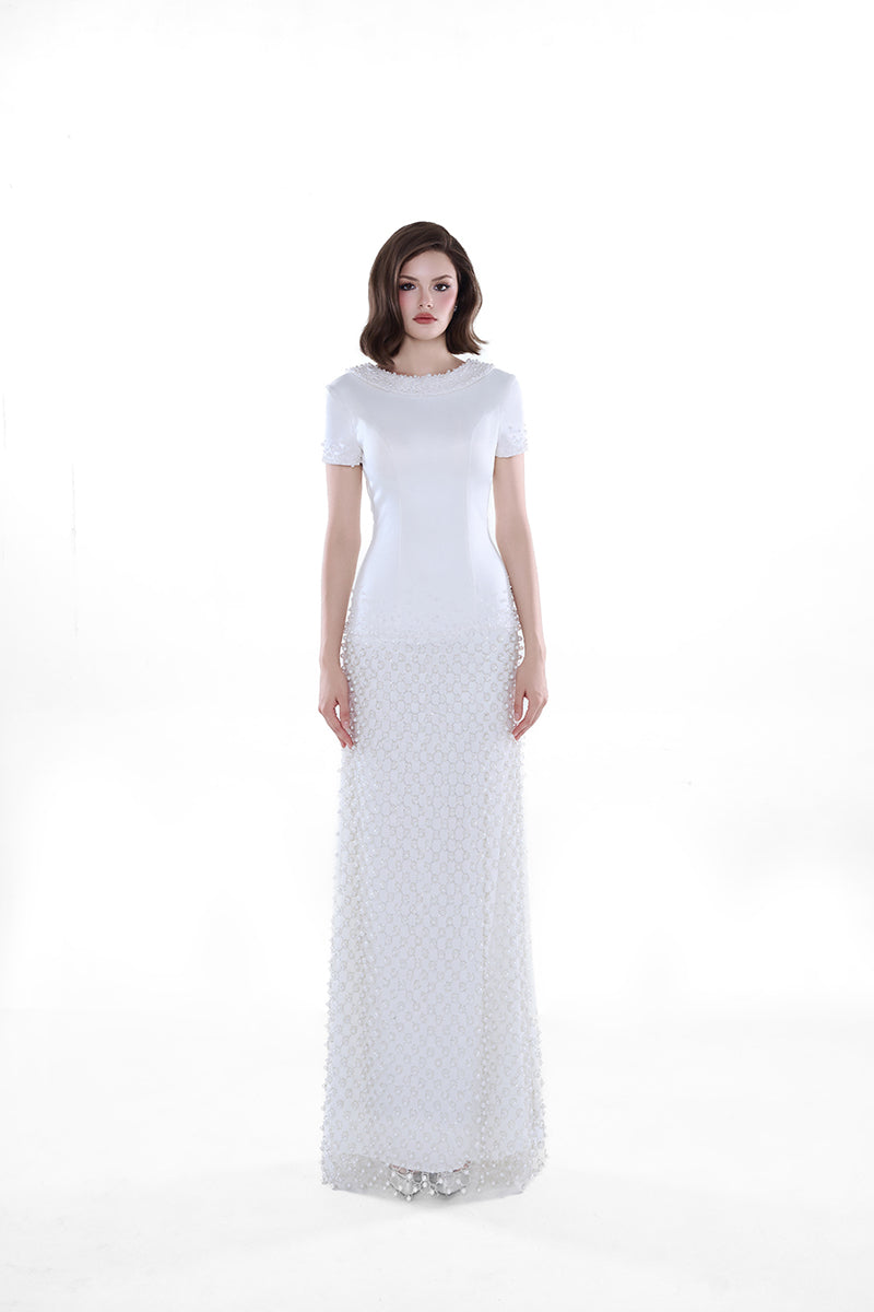 Ivory Camellia Pearl Column Gown by HACCHIC COUTURE, a sleek maxi dress with elegant pearl embellishments.