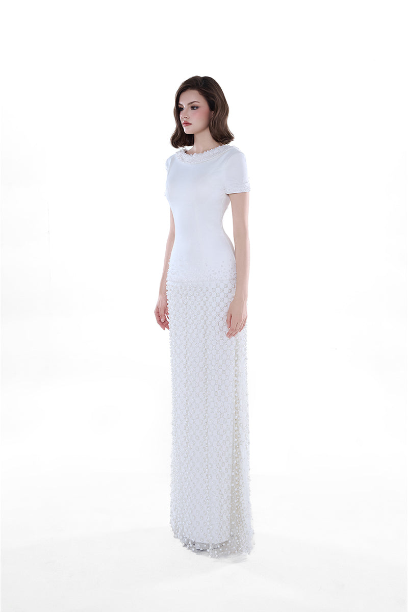 Elegant ivory Camellia Pearl Column gown by HACCHIC COUTURE, showcasing a sophisticated maxi dress with pearl embellishments.