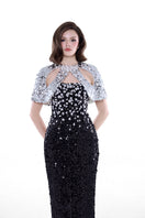 Black Luna floral sequin gown by HACCHIC COUTURE featuring intricate floral embroidery and shimmering sequins on elegant fabric.